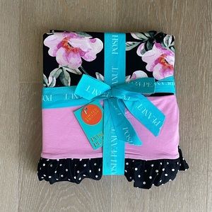 Posh peanut ruffled reversible blanket